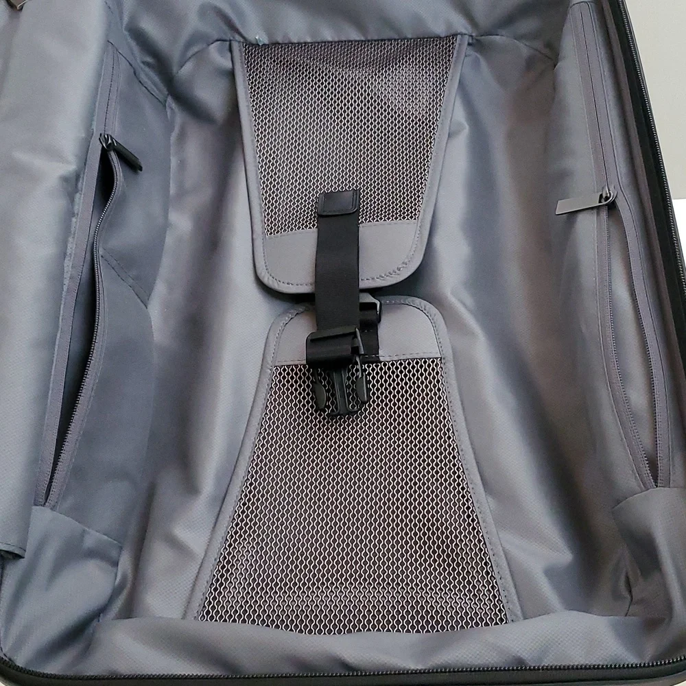 NWOT Tumi Latitude International Carry-On Spinner Luggage in Silver